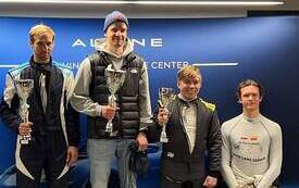 Adam Suchodolski na podium w Rajdzie Modlin