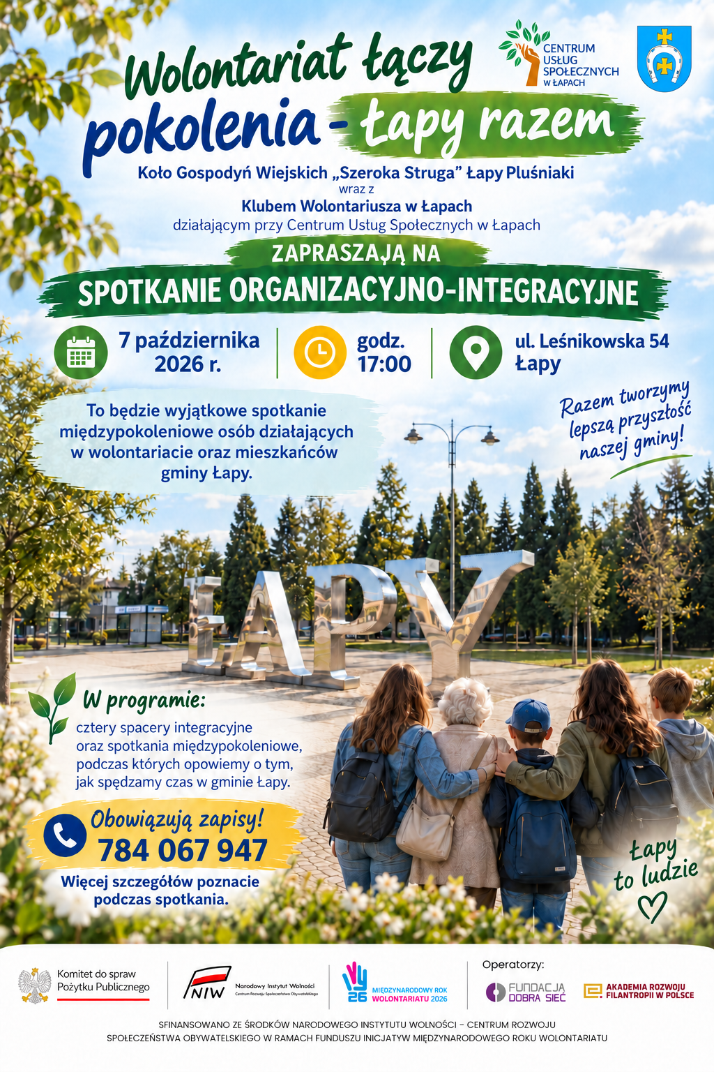 plakat ze zdjęciem z napisem Łapy w centrum miasta